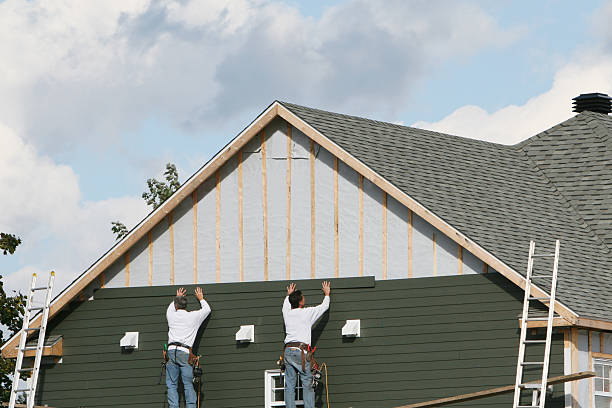 Professional Storm Damage Siding Repair technician working in Manasquan, NJ